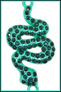 Image shows a mint green snake charm covered with black rhinestones
