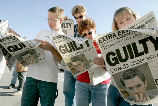 Group of people reading newspaper with the headline "GUILTY: Crowd cheer verdict"