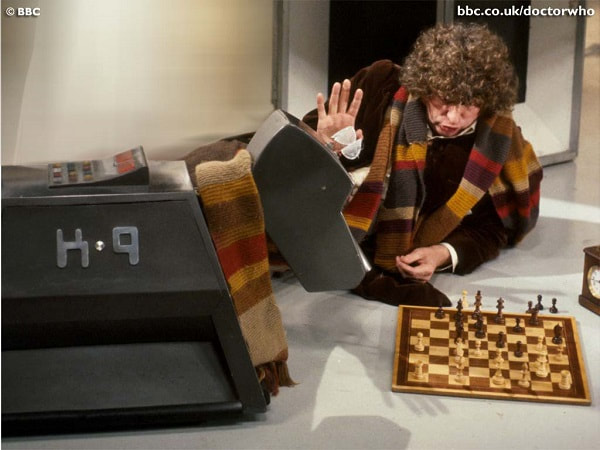 The Fourth Doctor and K-9 playing chess