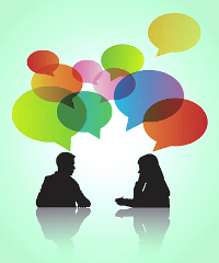 Image shows silhouettes of the torsos of a male and female with multicolored speech bubbles  