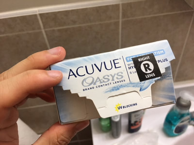 Box of Acuvue Oasys contact lenses